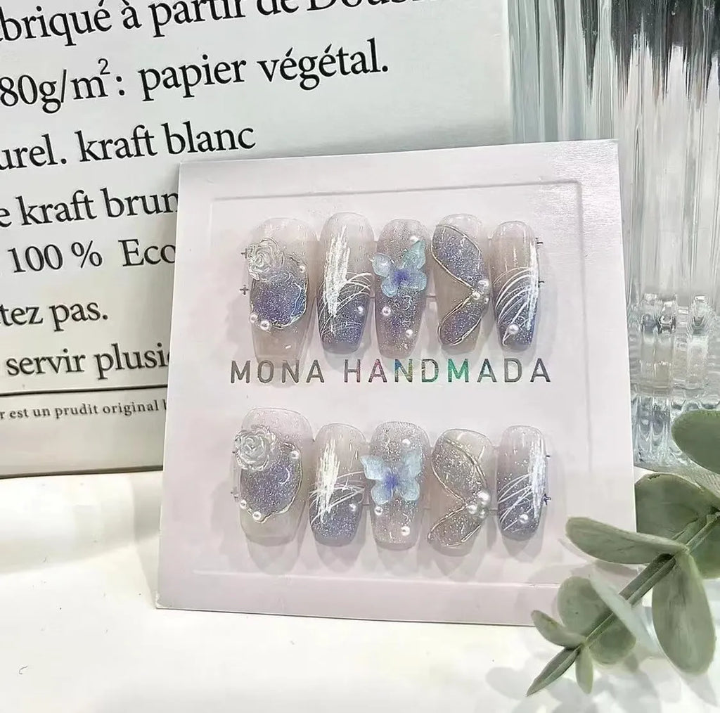 Hand-wearing bridal fake nails sequins set in four sizes with glue and tools for nail art