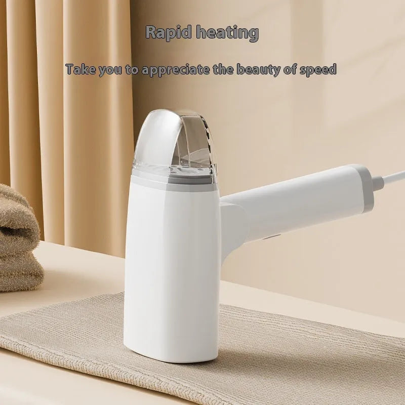 Blue and white handheld garment steamer with water tank and mechanical controls for wrinkle removal