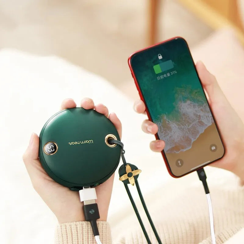 Green portable power bank with hand warmer function showing digital display and Type-C port