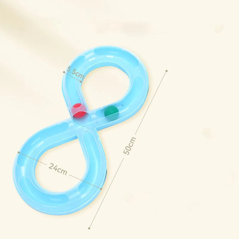 Blue and white cat toy set with a turntable track ball and a teasing stick on a floor.