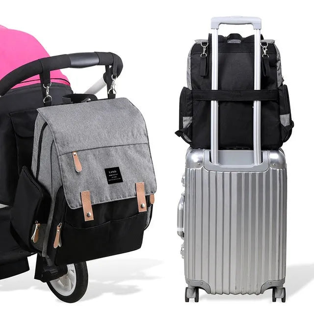 LAND Mommy Diaper Backpack in oxford cloth with changing mat, shown in grey colour.
