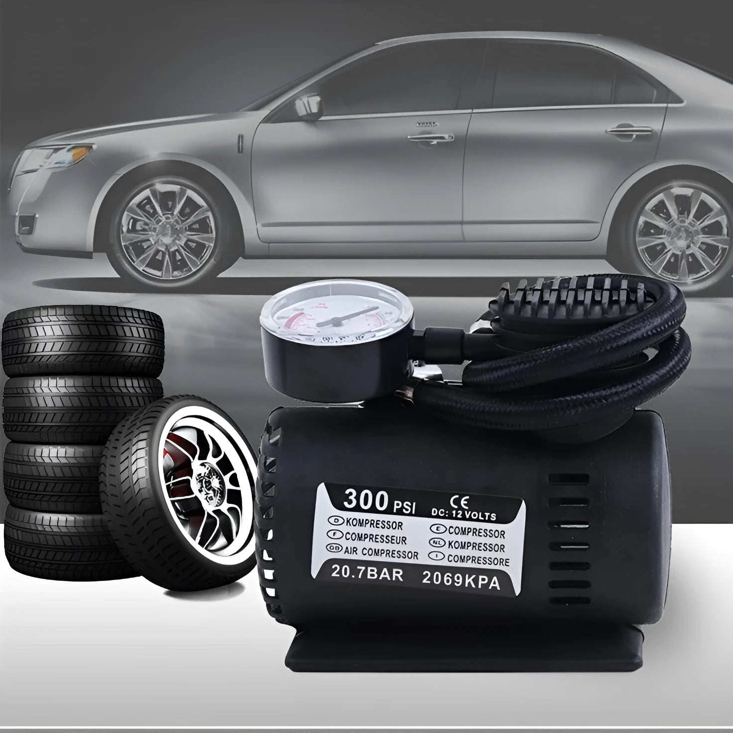 Mini 12V car air compressor in black with pressure gauge and 9-foot cord