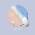 Small square 220x220mm solid colour rubber mouse pad on a desk.