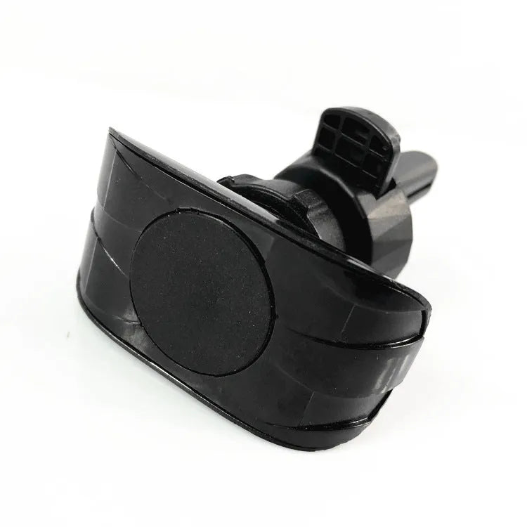 Black car phone holder clipped to a car air vent