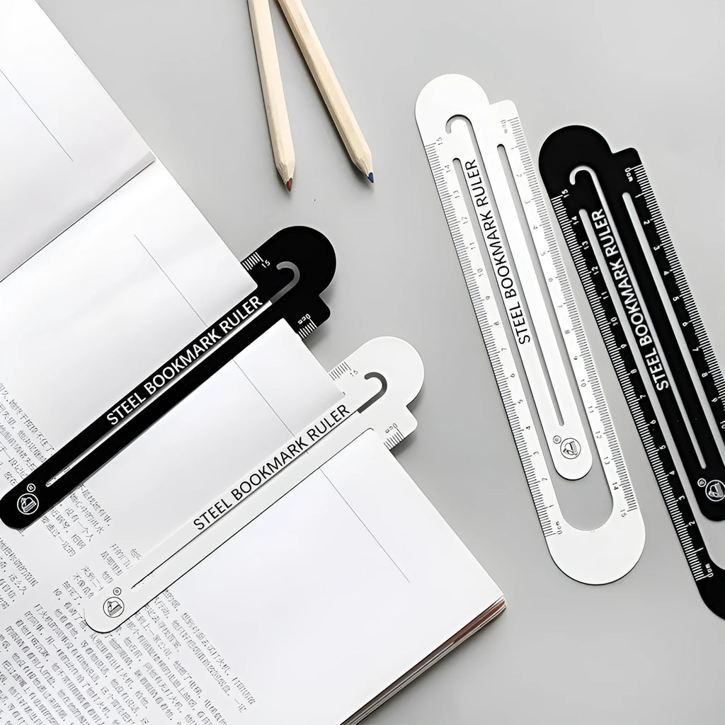 Black and white two-sided ruler 12cm long on white surface