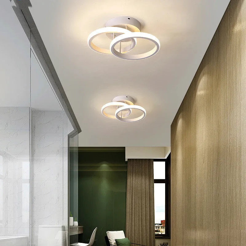Three styles of commercial LED corridor ceiling lights: black semicircle, white circle, and white bipartite.