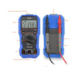Handheld digital multimeter with NCV voltage sensing and test leads on white background