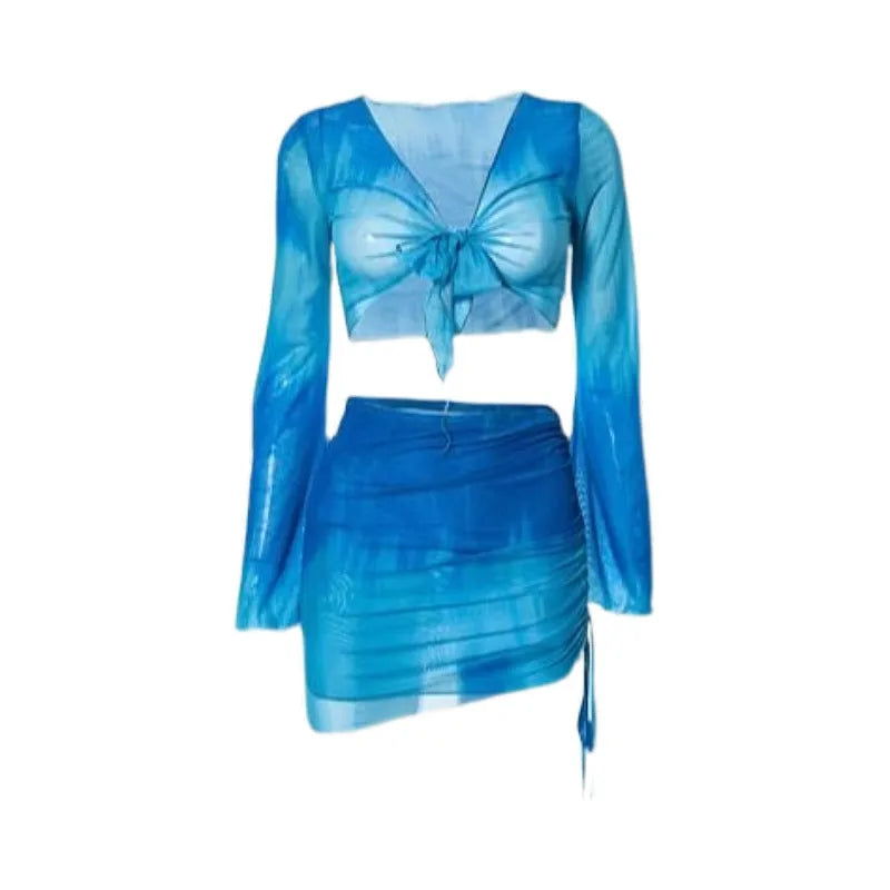 Women's blue four-piece bikini swimsuit set showing shirt, bra, high-waist brief, and skirt for swimming and fitness