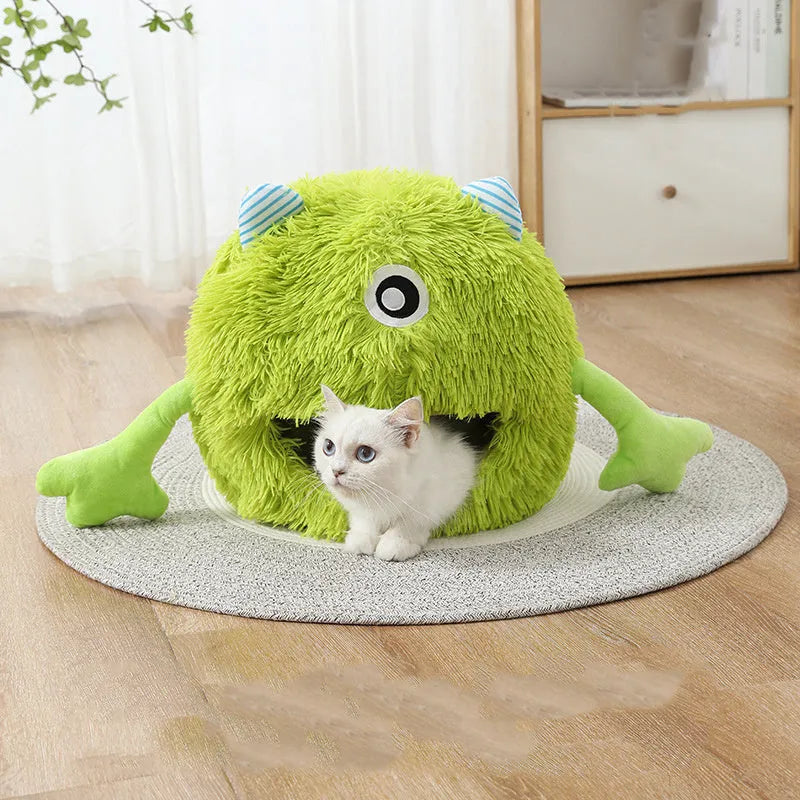 Round fluffy cat bed with soft plush surface and non-slip base