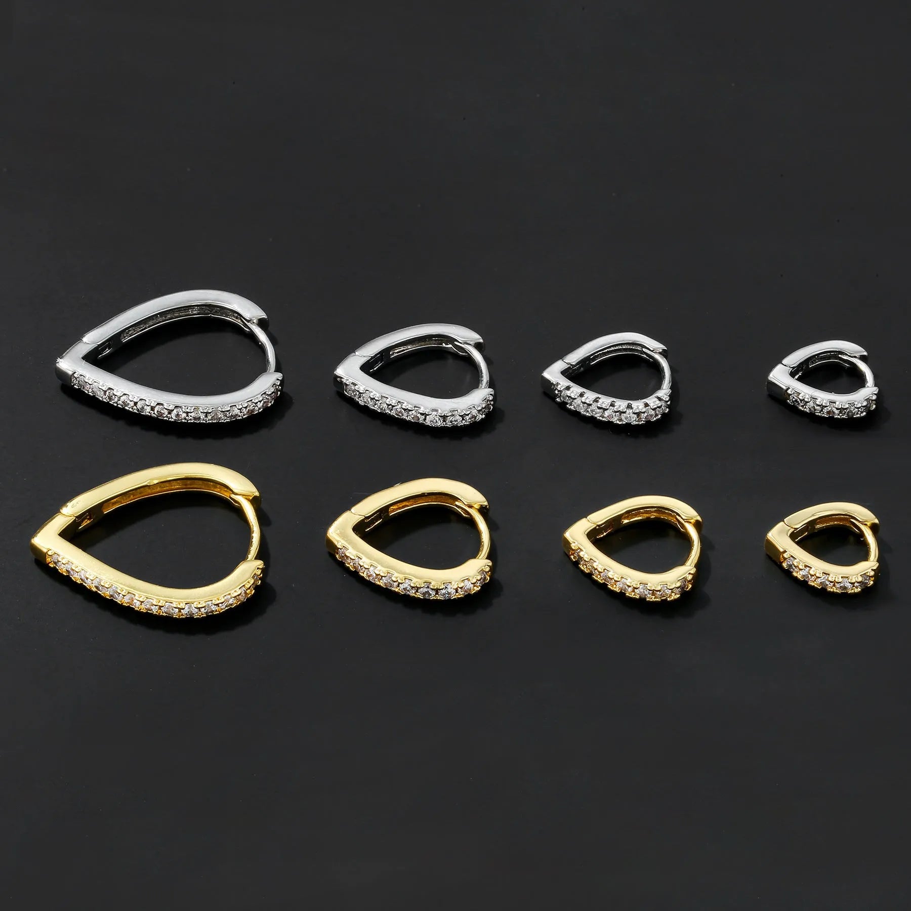 Geometric copper ear clip with love heart motif in gold electroplated finish