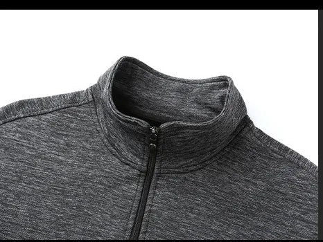 Men's black athletic fit zip-up jacket with stand-up collar on hanger