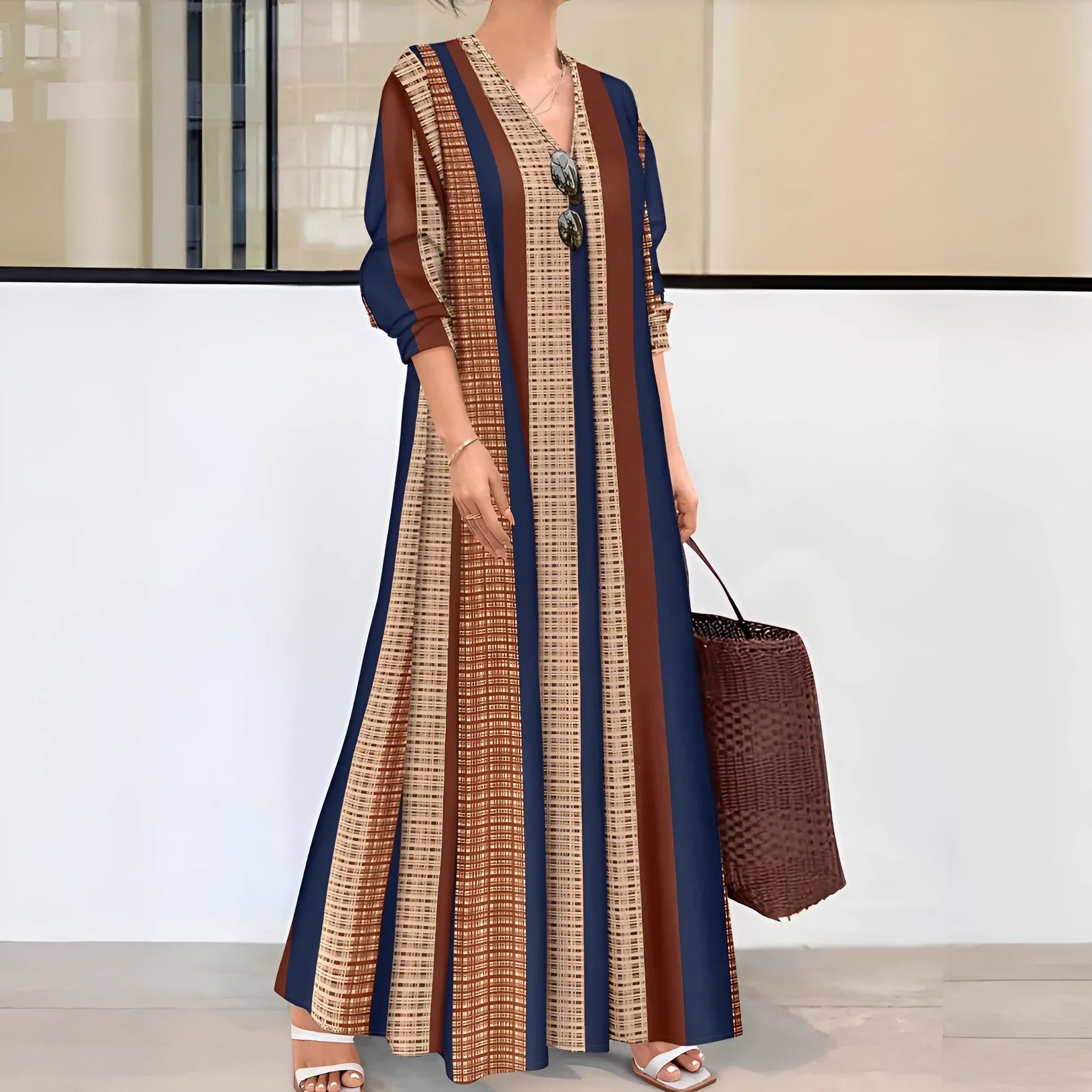 Camel coloured vertical striped V-neck long dress with A-line silhouette and long sleeves