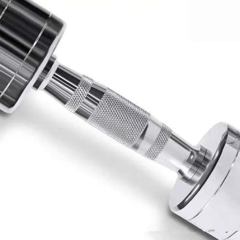 Silver pure steel dumbbell with ergonomic handle on a plain background