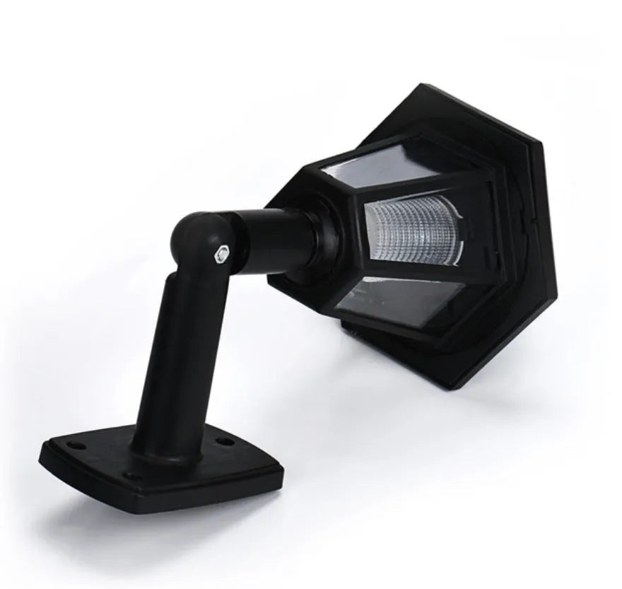 Black hexagonal solar wall lamp with IP44 waterproof rating for outdoor garden installation