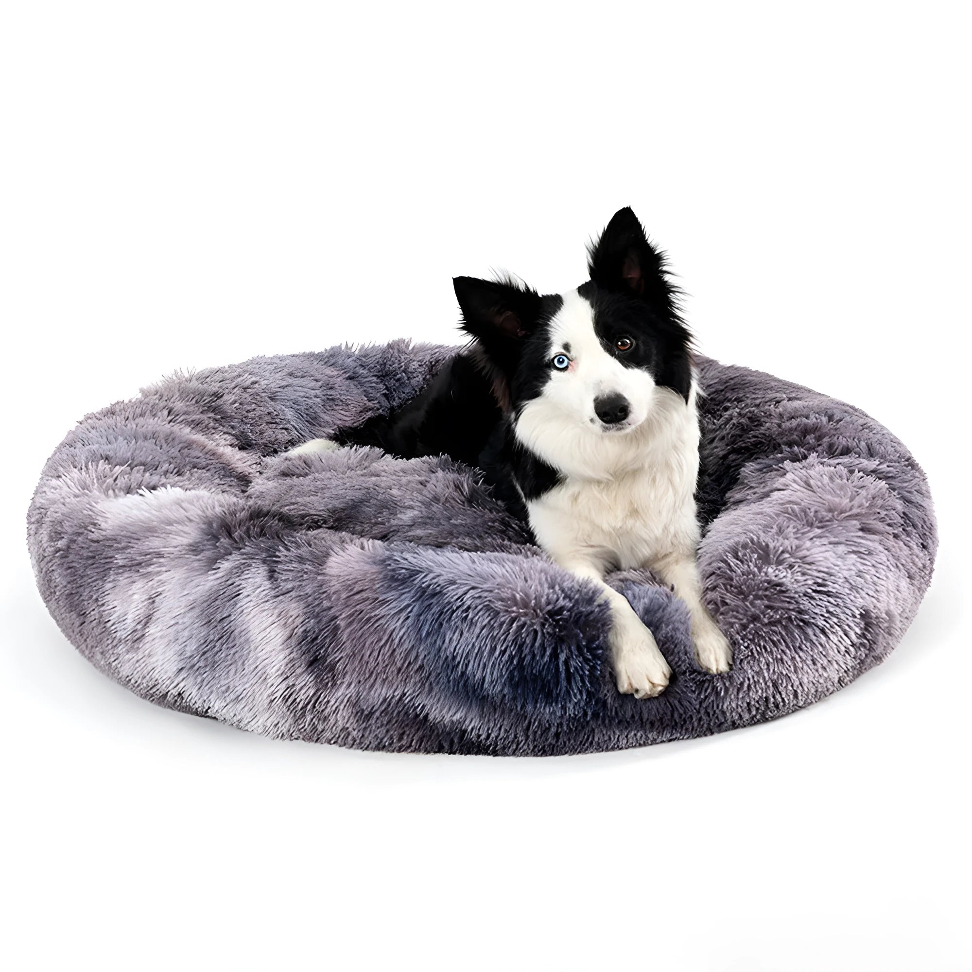 Fluffy donut-shaped dog bed in long plush fabric, shown in a light grey colour without a zipper.