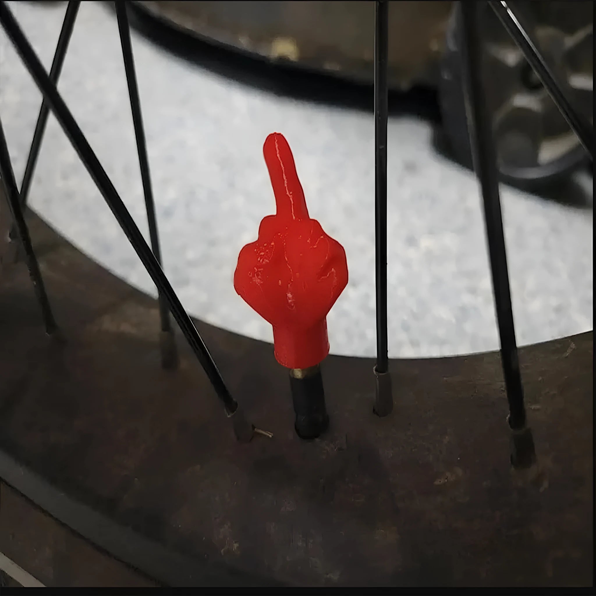 Eight car tyre valve caps, four black and four beige, made from latex rubber with standard threads