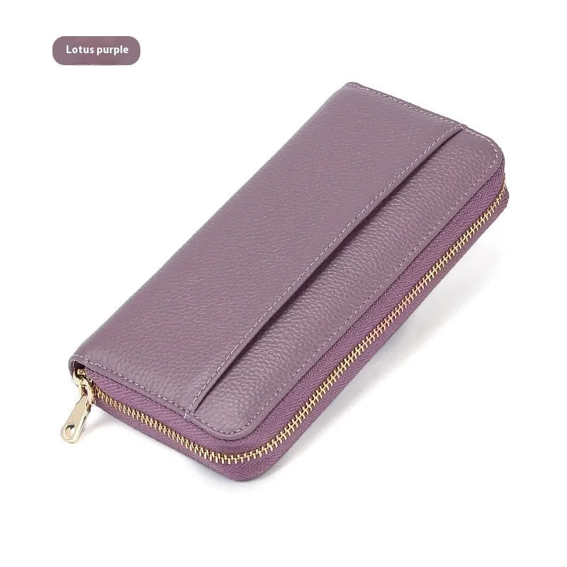 Long women's genuine leather wallet in solid colour with anti-theft card swiping feature and large storage capacity