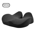 Solid colour memory foam office chair cushion showing light grey, black, and green options.