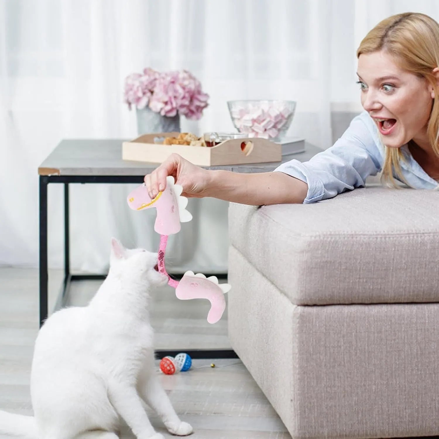 Set of four plush cat toys including a fish, mouse, bunny, and chew toy in assorted colours.