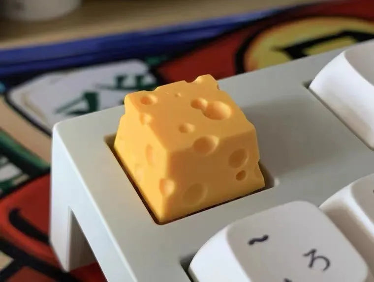 Yellow resin cheese key cap for mechanical keyboards with food-themed design