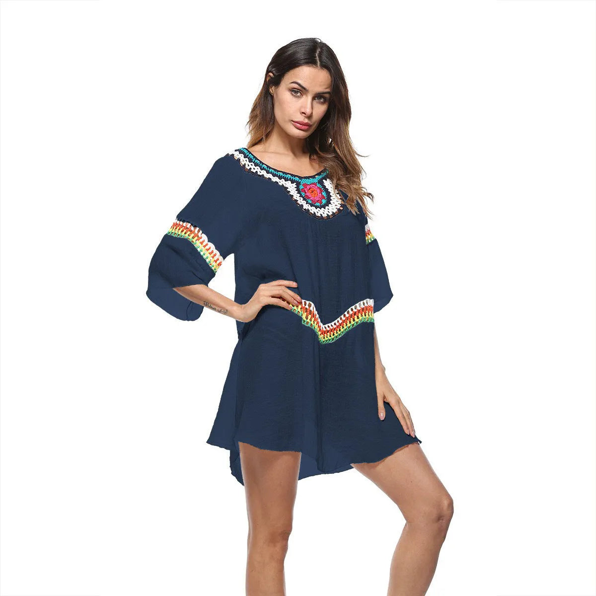Crocheted ethnic style sun protection clothing for women in apricot, black, sapphire blue, or white.
