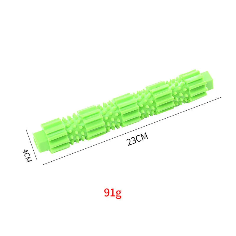 Green and orange rubber dog chew toy with treat dispensing opening and textured surface for aggressive chewers