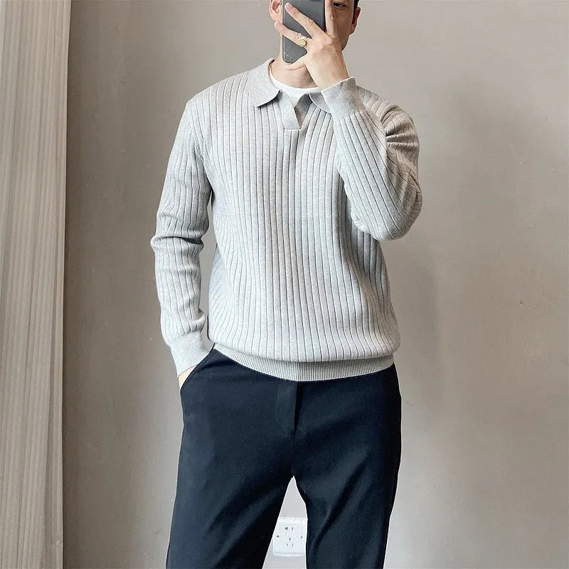 Man wearing a loose fit striped lapel pullover sweater in a rabbit fur and modal blend.