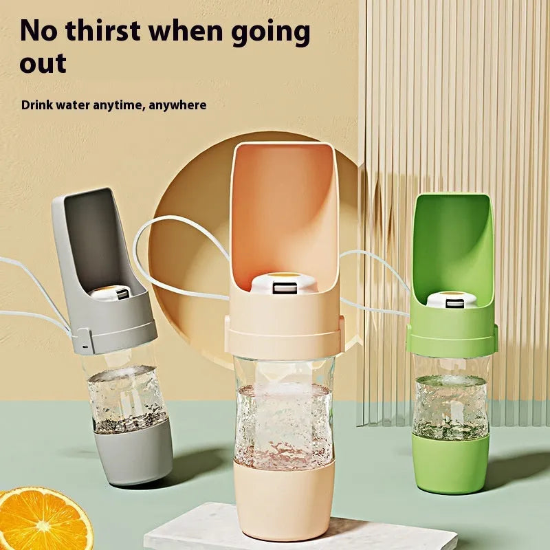 2-in-1 travel dog water bottle with 690ml capacity and green lanyard, folded to 20cm x 9cm, showing transparent body and dual compartments