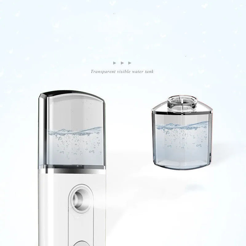 Portable facial nano mist humidifier in white, 10cm long, with 20ml water tank and USB cable