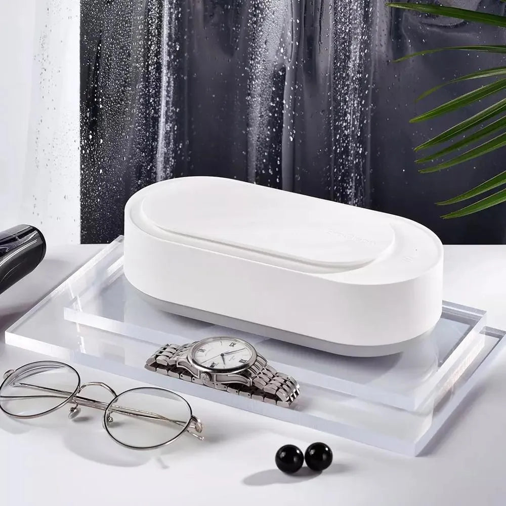White portable ultrasonic cleaning machine with touch button and stainless steel tank.
