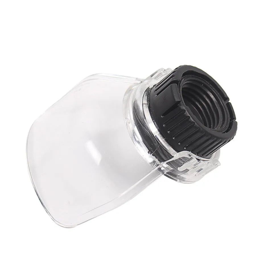 Transparent plastic horn safety cover for Delta electric grinders on a workbench.