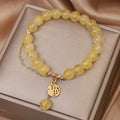 Natural stone citrine bracelet with Chinese character tassel design, electroplated finish