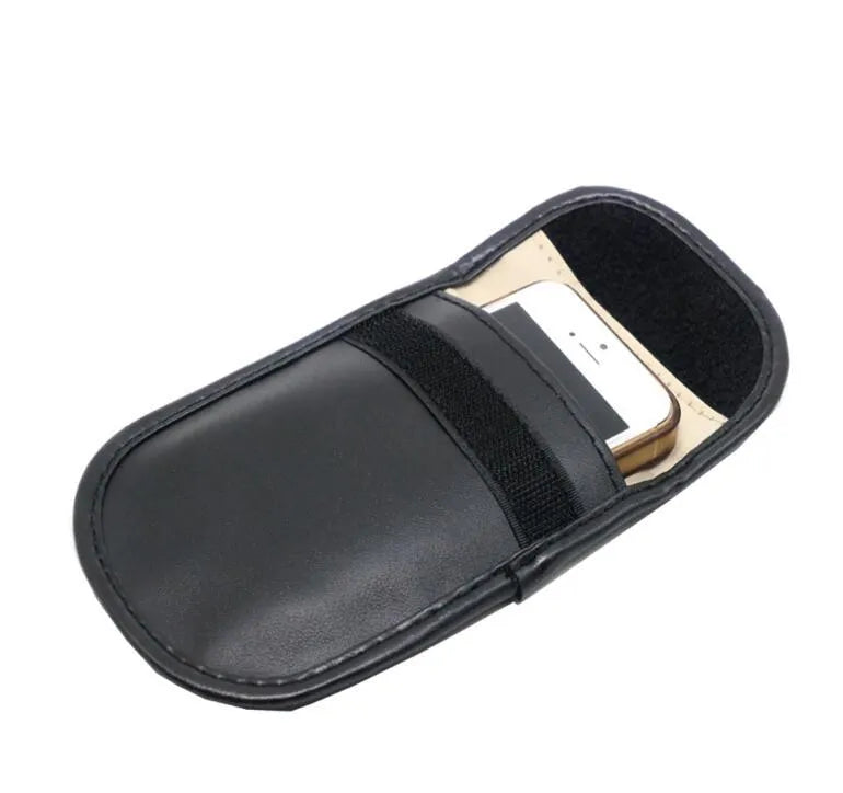 Black microfiber RFID-blocking Faraday bag for car key fobs and credit cards.
