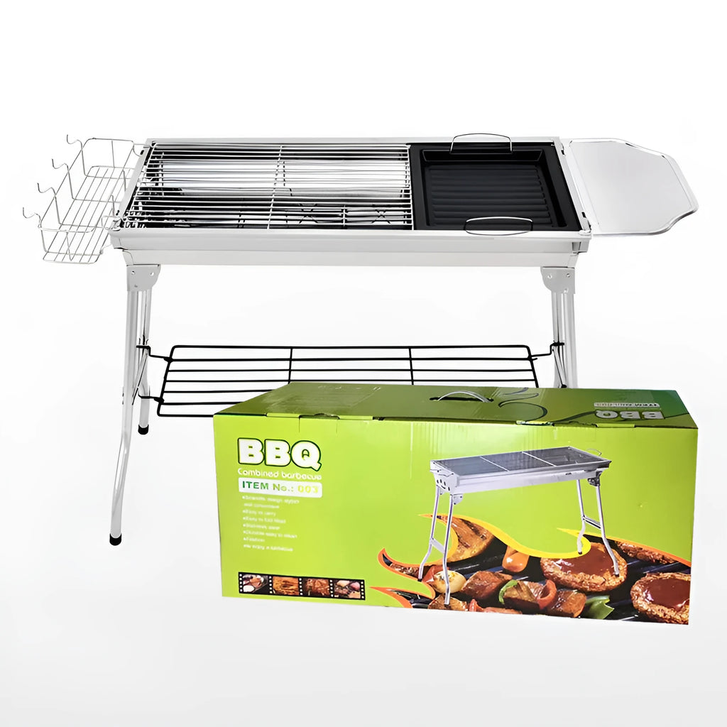 Stainless steel portable folding barbecue oven with large grill, shown outdoors.