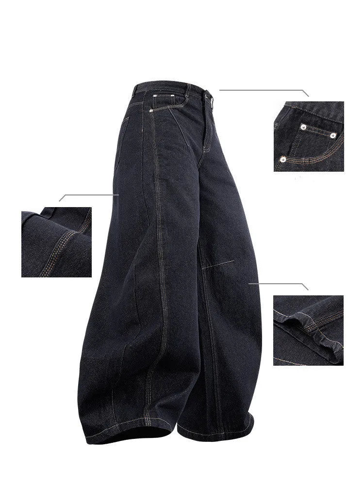 Men's wide leg cotton denim trousers in original cow colour, shown laid flat.