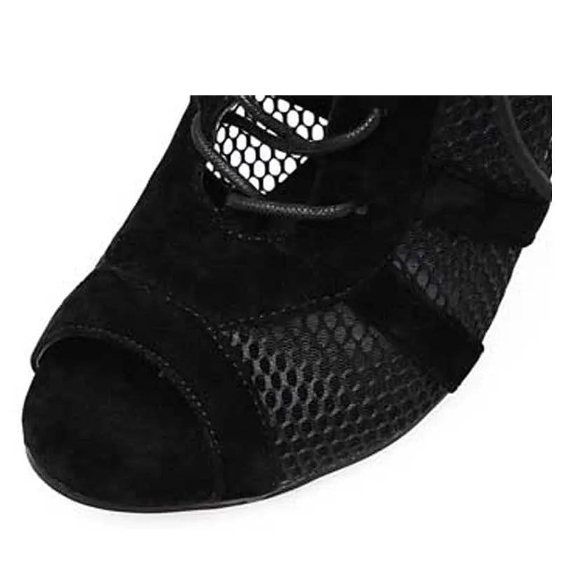 Black suede women's lace-up high heel shoes with 11.5 cm heels shown from side view