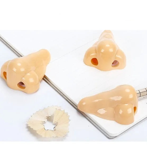 Flesh colour plastic pencil sharpener with big nostril design and geometry shape for student stationery