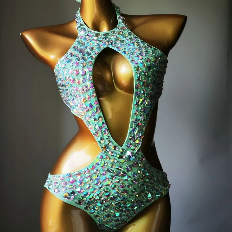 Women's one-piece swimsuit with a decorative mesh diamond pattern on the front, shown in army green.