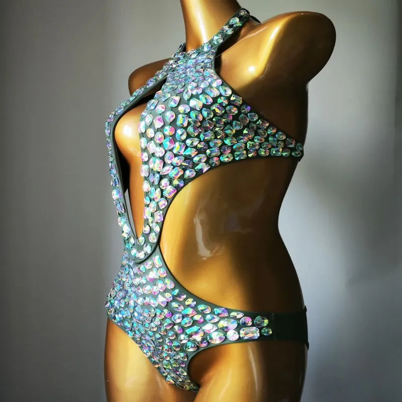 Women's one-piece swimsuit with a decorative mesh diamond pattern on the front, shown in army green.