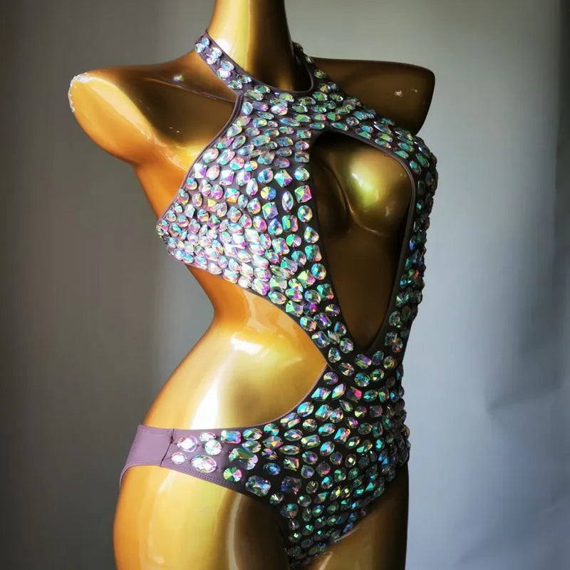 Women's one-piece swimsuit with a decorative mesh diamond pattern on the front, shown in army green.