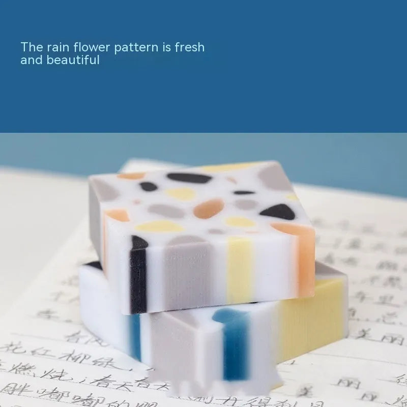 Brick-shaped solid rubber traceless eraser for pencil correction.
