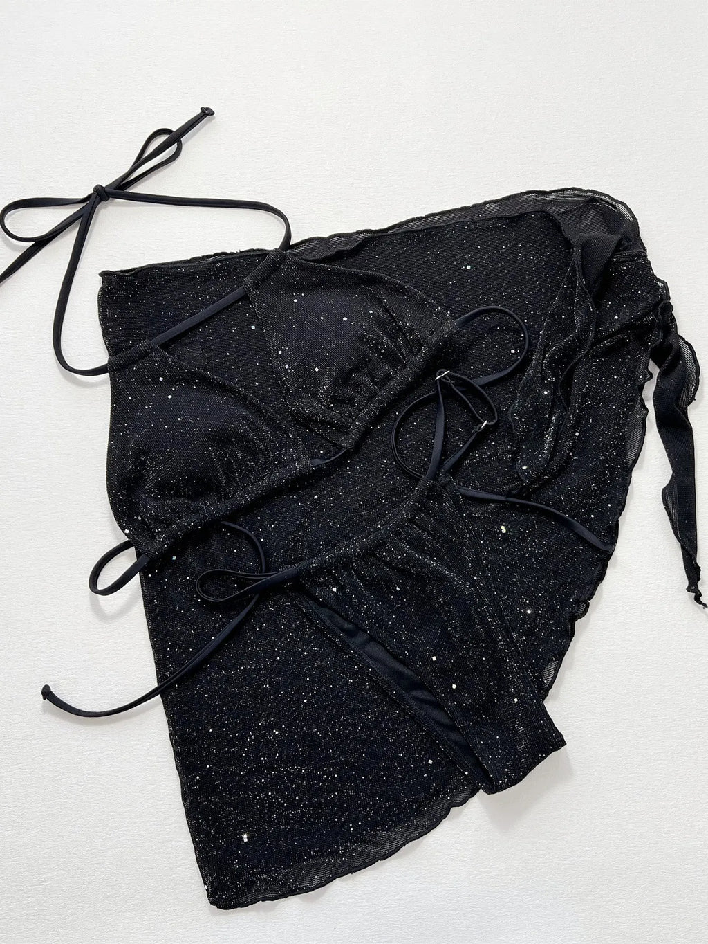 Black three-piece bikini swimsuit set with separate top and shorts