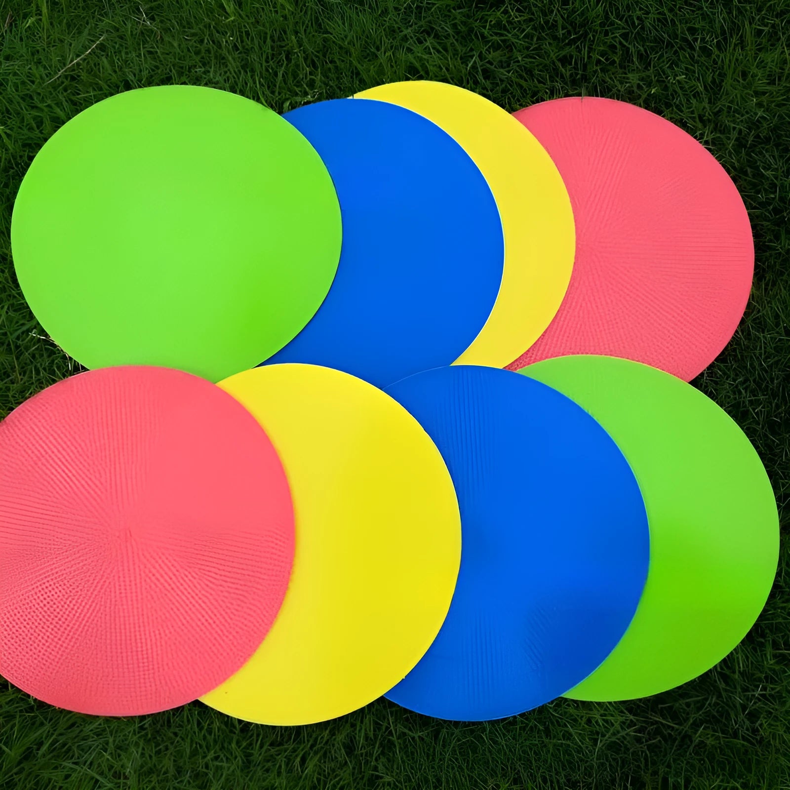 Soft TPE football training target pad measuring 23cm in diameter, available in six bright colours