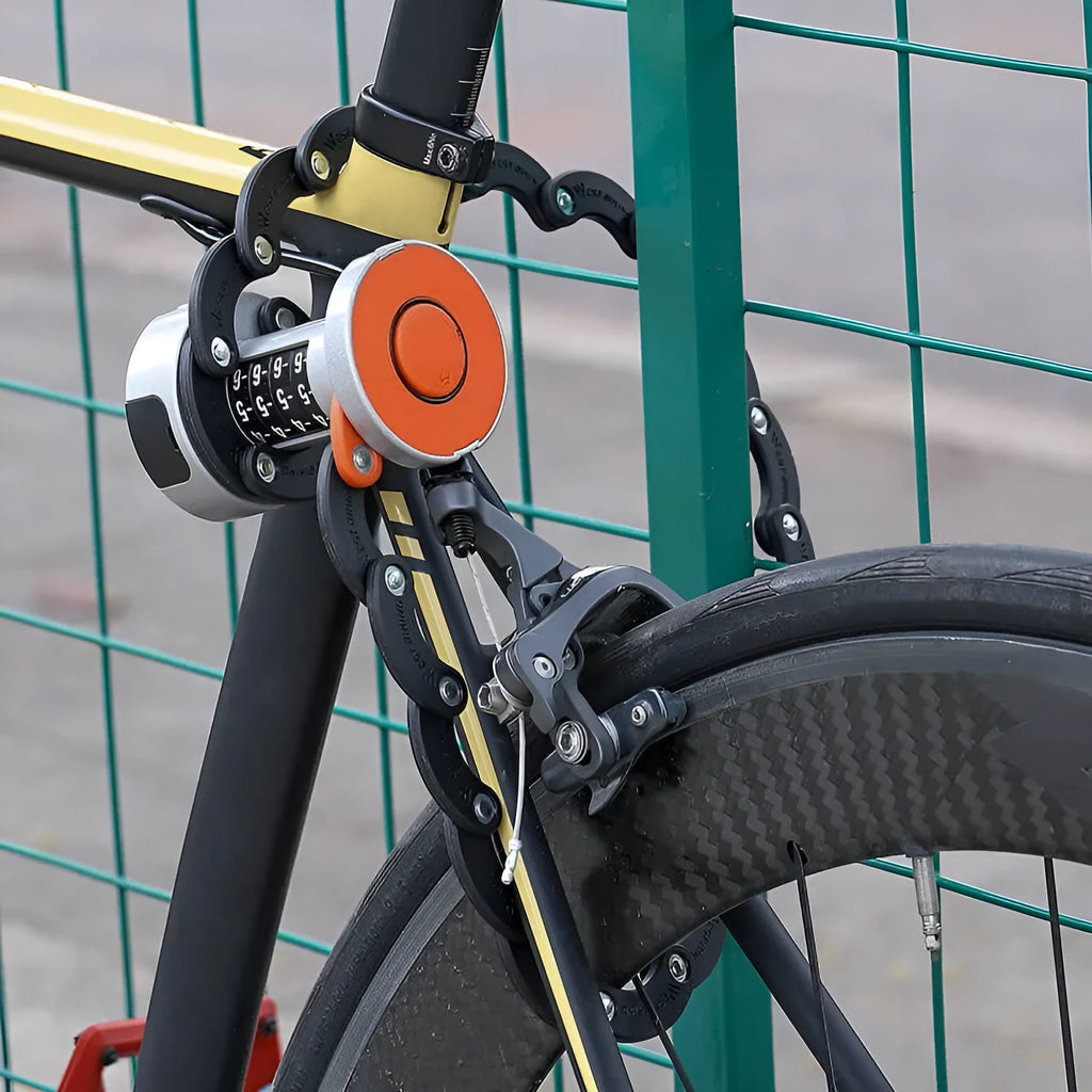 Black and black orange portable bicycle folding lock with a modern design on a white background.