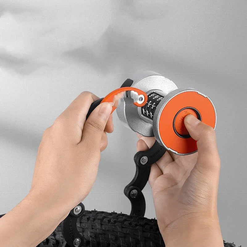 Black and black orange portable bicycle folding lock with a modern design on a white background.