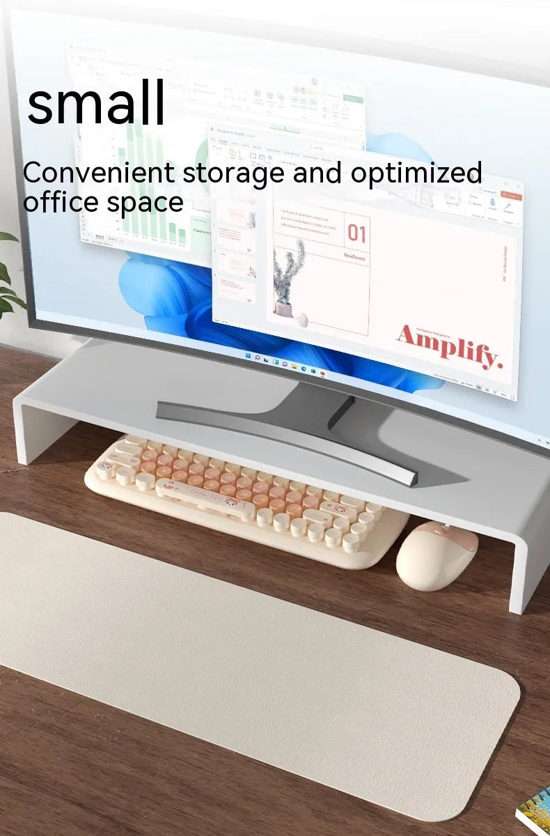 Candy pink wireless keyboard and mouse set with compact design on a desk.