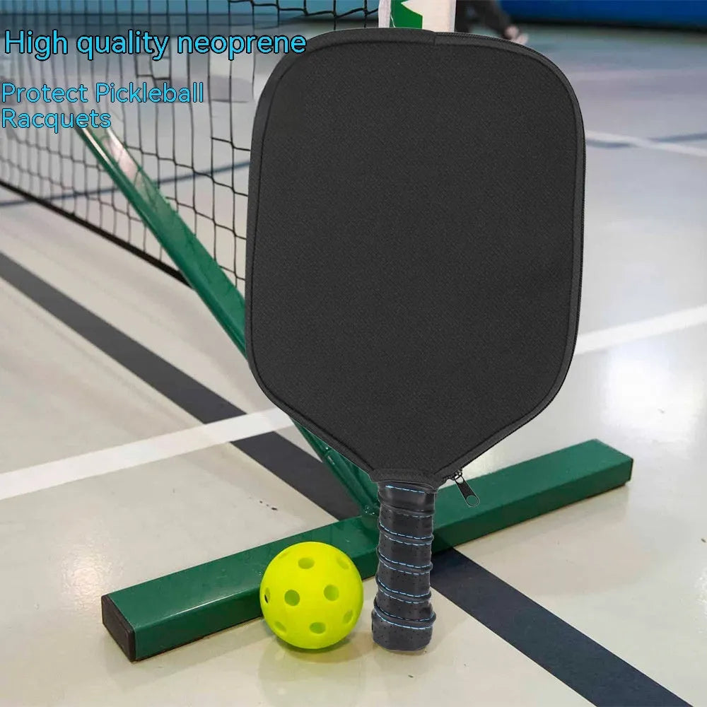 Black neoprene protective sleeve for table tennis racket, laid flat on surface
