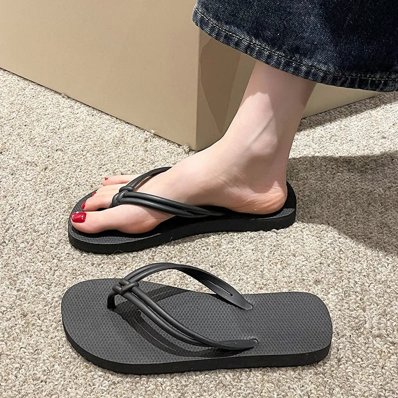 PVC casual flip flops in a toe-covering style on a plain background, showing the one-piece moulded construction.