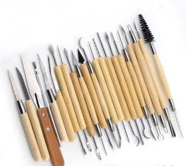 27-piece pottery clay tool set with stainless steel, wooden, and plastic tools in roll package