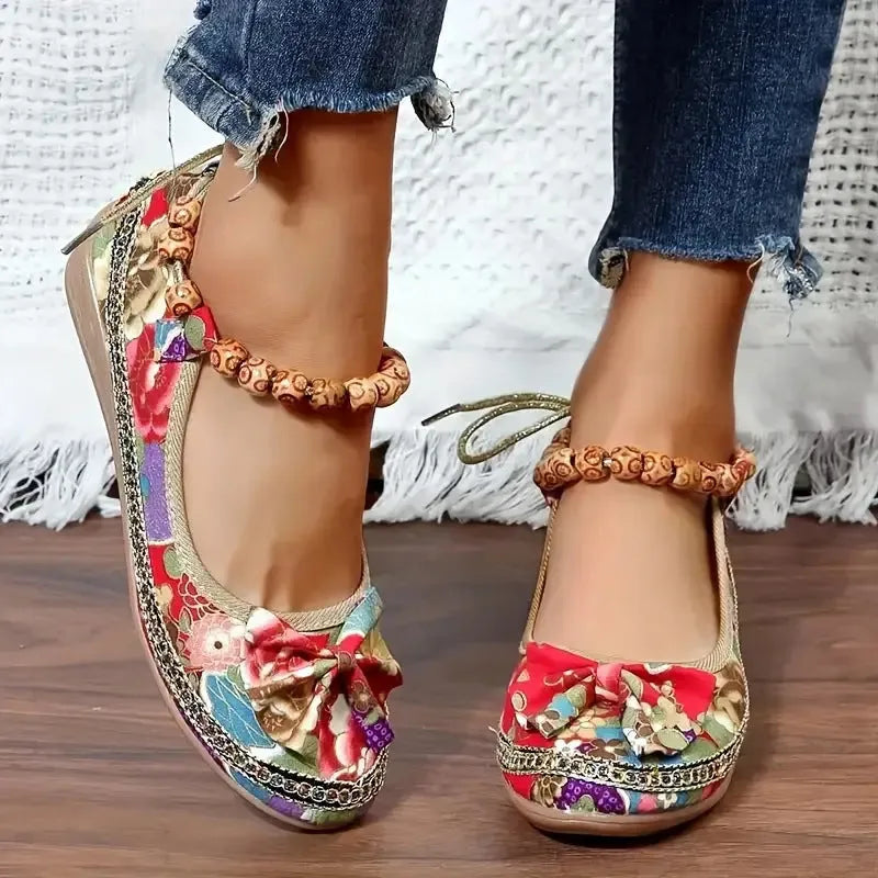 Women's plus size ethnic platform sandals with cloth upper and elastic band fastening in black colour